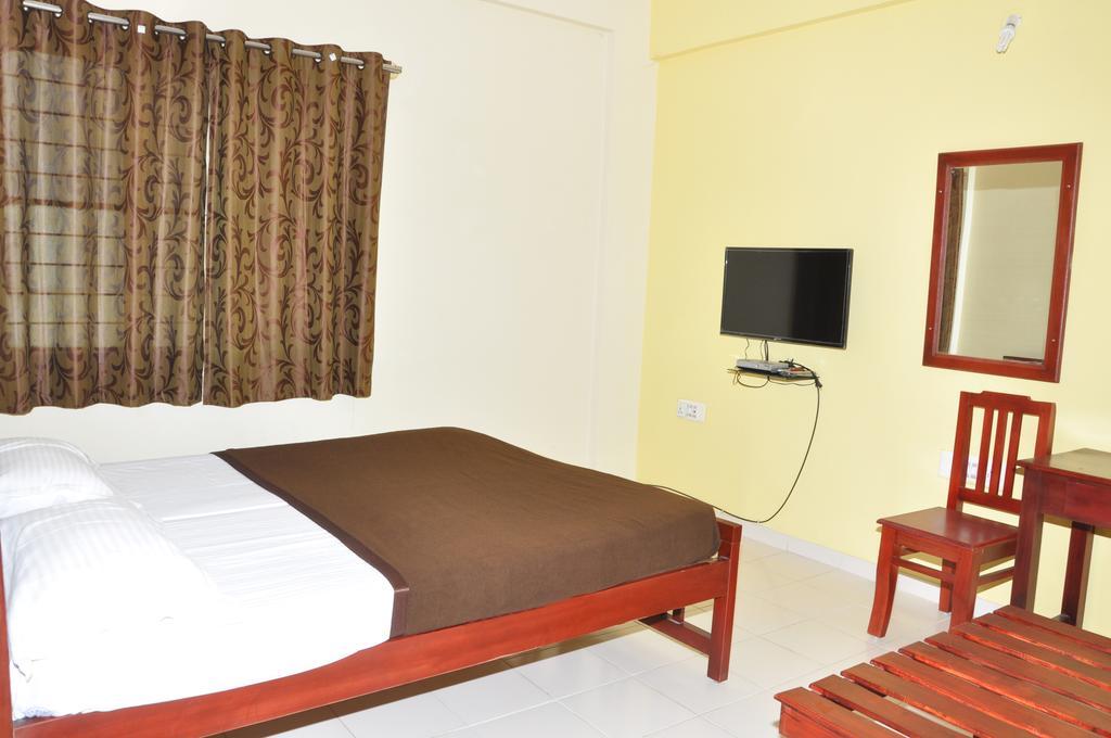 เวกา เรสซิเดนซี่ Hotel บังกาลอร์ ห้อง รูปภาพ