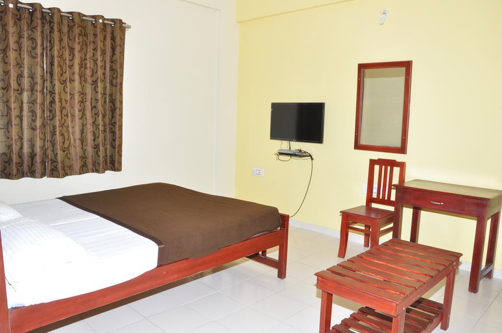 เวกา เรสซิเดนซี่ Hotel บังกาลอร์ ห้อง รูปภาพ