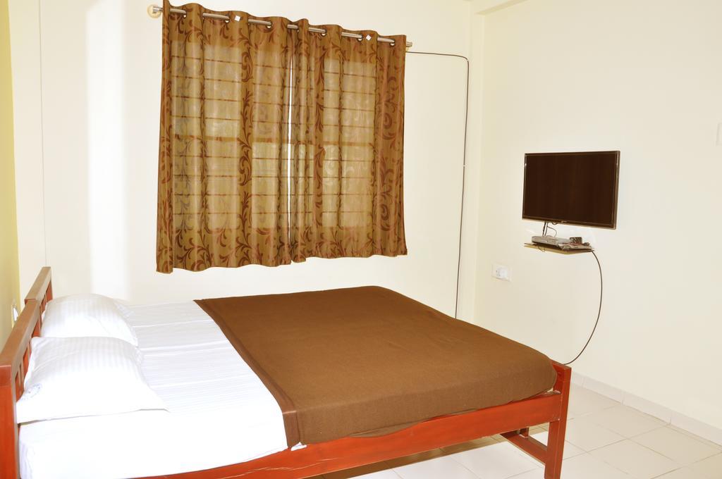 เวกา เรสซิเดนซี่ Hotel บังกาลอร์ ห้อง รูปภาพ